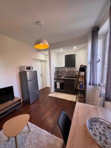 Le Vercingetorix - Appartements meubles : photos des chambres