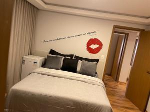 Apto 2 suítes, wifi e estacionamento