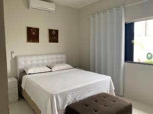 CASA COM PISCINA NA PRAIA