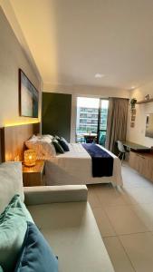 Flat em Muro Alto Porto de Galinhas no Malia Beach Experience - VivahFlats