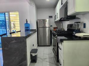 Apartment in front of beach, AC, Wifi, Hot Water