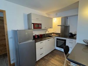 Appartement prestige à 50m des pistes avec balcon et vue - FR-1-445-215