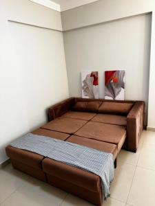 Apartamento no centro, 2 quadras do mar com ar condicionado, vaga de garagem e elevador