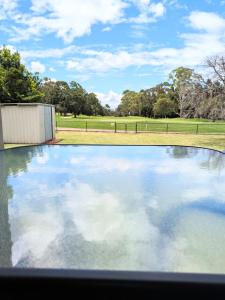 Home with Golf Course Frontage !