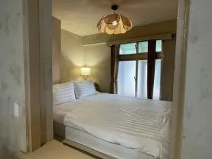 Tongzhuang B&B 依人數開放房型 - Тайнань