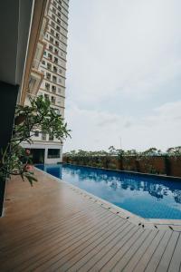 Tmansari Mahogany Apartement By Cozy