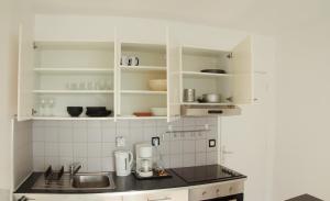Appartements 400m de la plage en centre ville, menage et frais de location inclus dans le tarif : photos des chambres
