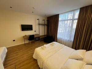 Andi Downtown Deluxe Rooms