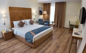 Golden Tulip Muscat