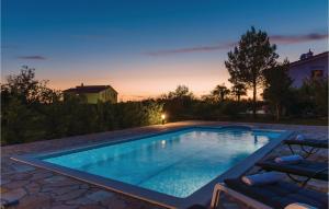 Three-Bedroom Holiday Home In Lozovac