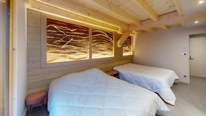 Appartements Les Neiges : photos des chambres