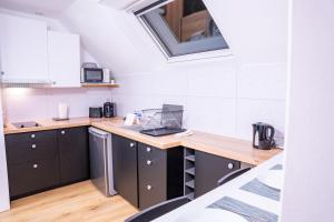 Appartements Evasion urbaine studio moderne a Chalon - BY PRIMO C0NCIERGERIE : photos des chambres