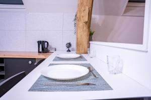 Appartements Evasion urbaine studio moderne a Chalon - BY PRIMO C0NCIERGERIE : photos des chambres