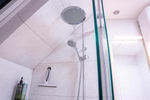 Appartements Evasion urbaine studio moderne a Chalon - BY PRIMO C0NCIERGERIE : photos des chambres