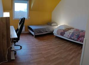 Appartements Maison de 82m2 proche du Mans avec parking prive : photos des chambres