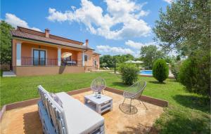 Two-Bedroom Holiday Home In Tinjan