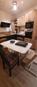 Appartements Le Fiacre : photos des chambres