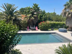 Appartements Chez Isa - avec piscine chauffee et jacuzzi : photos des chambres