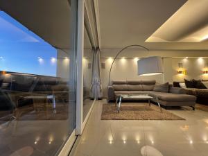 Sky-High Sauna Penthouse Retreat with City Views