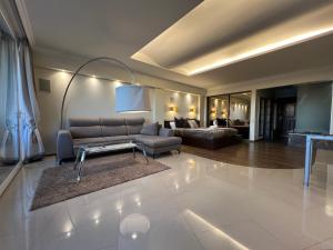 Sky-High Sauna Penthouse Retreat with City Views