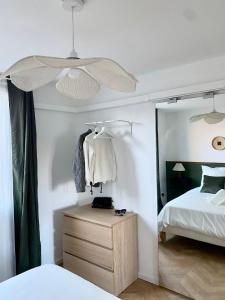 Appartements L-ecrin vert - Wifi - Netflix - Climatisation - Parking Gratuit : photos des chambres