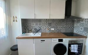 Appartements L-ecrin vert - Wifi - Netflix - Climatisation - Parking Gratuit : photos des chambres