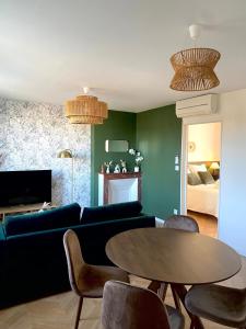 Appartements L-ecrin vert - Wifi - Netflix - Climatisation - Parking Gratuit : photos des chambres