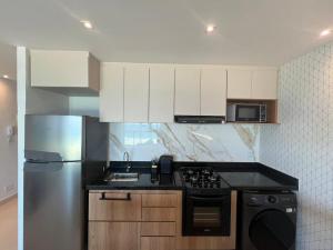 Lindo Flat na praia de Itaipuacu