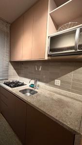 Apto confortável e prático na Savassi