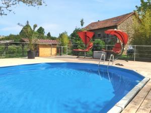 Maisons de vacances Maison charmante a Charron avec piscine partagee : photos des chambres
