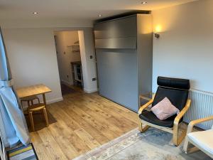 Tiny house with pull down bed