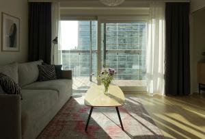 Modern 1BR with Huge Balcony Above Mall of Tripla