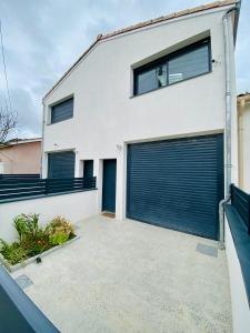 Appartements Maison Arkea Arena avec menage, draps et serviettes inclus : photos des chambres