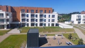 APARTAMENT BALTICHOFF FUN with Sea View, Basen, Spa, Gym, Sauna, Hala sportowa z kortem tenisowym