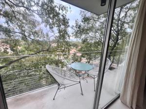 Cocon luxe vue balcon sauna jacuzzi piscine