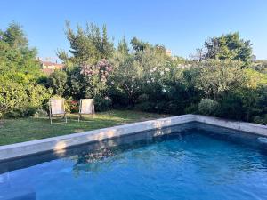 Appartements Cocon luxe vue balcon sauna jacuzzi piscine : photos des chambres