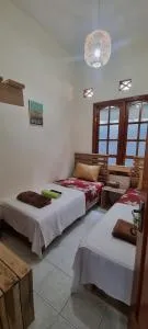 Taefoo Homestay - Brussels Room Free Wifi, Fan & Shared Baths Cool & Cozy - Timuran