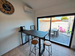 Maisons de vacances Maison classe 3 etoiles Perols avec terrasse et clim : photos des chambres