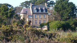 Maisons de vacances Evasion aux Caraibes Bretonnes - Votre havre de paix a Perros Guirec : photos des chambres