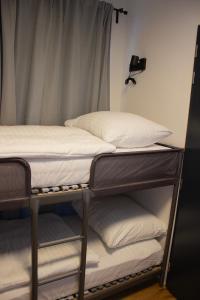 ENJOYHARRACHOV - Atraktivní slunný klimatizovaný apartmán 24 v centru Harrachova se saunou, parkováním, Wifi-WLAN, SAT, herní konzolí, Netflix zdarma a možností dobíjení auta jen 150m od lanovky