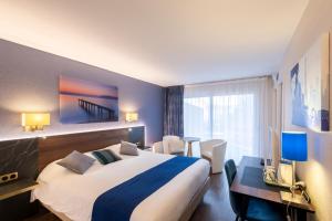 Hotels Logis Hotel Arc En Ciel : photos des chambres