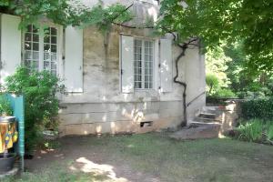 Appartements Appartement charmant a Rouffilhac avec vue sur jardin : photos des chambres