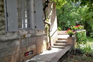 Appartements Appartement charmant a Rouffilhac avec vue sur jardin : photos des chambres