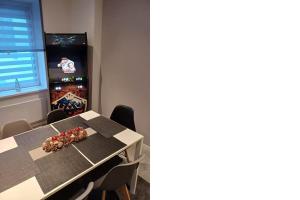 Entire house with arcade machine in a private backyard, 3 bedrooms, 1 bathroom, 1 leaving room with convertible sofa and open kitchen