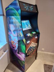 Entire house with arcade machine in a private backyard, 3 bedrooms, 1 bathroom, 1 leaving room with convertible sofa and open kitchen
