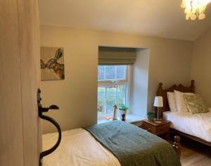 Kielder Cottage overlooking Kielder reservoir