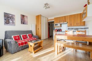 Appartements T2 et T3 L'esprit chalet au coeur du centre ville et 80 m de la telecabine : photos des chambres