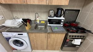 O07 Luxury Furnished Studio Apartment near bus stop Garden view Persia Cluster