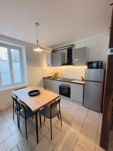 Le Vercingetorix - Appartements meubles : photos des chambres