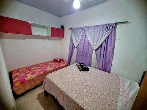 Casa com piscina em Bertioga 700m da praia